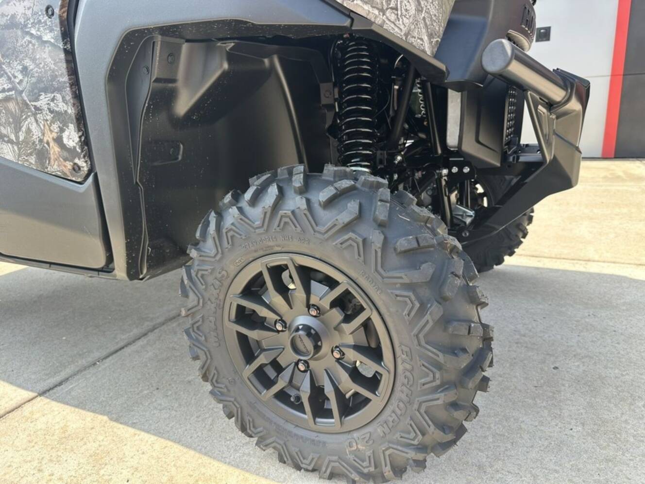 A photo of this 2026 Honda® Pioneer 1000 Deluxe TrueTimber atera camo