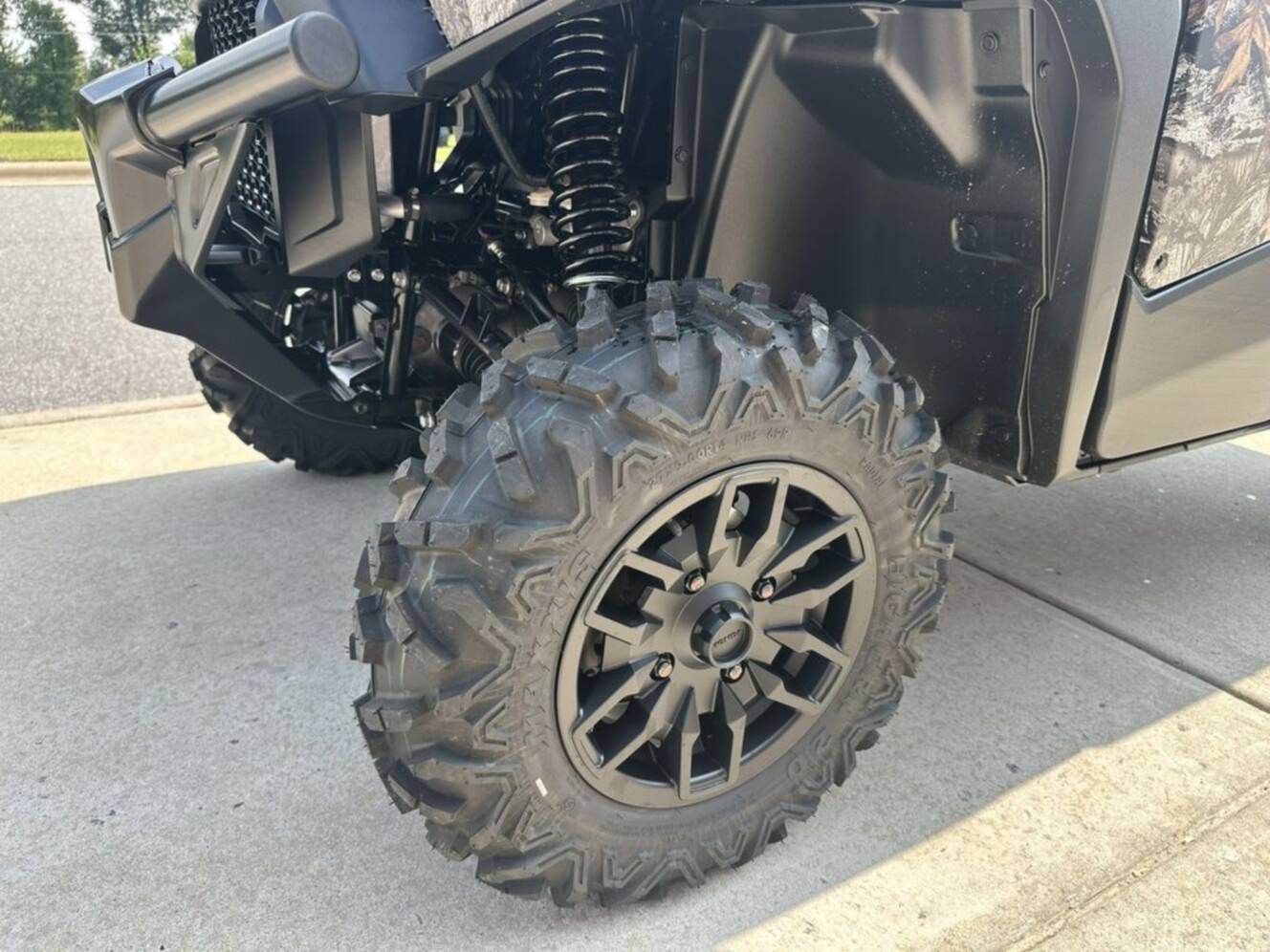 A photo of this 2026 Honda® Pioneer 1000 Deluxe TrueTimber atera camo