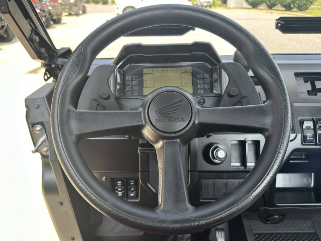 A photo of this 2026 Honda® Pioneer 1000 Deluxe TrueTimber atera camo