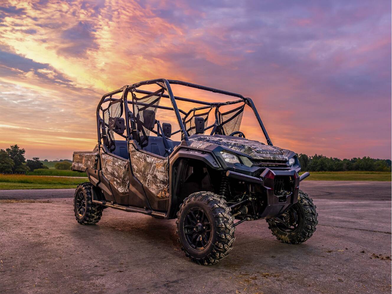 A photo of this 2025 Honda Pioneer 1000-6 Deluxe Crew