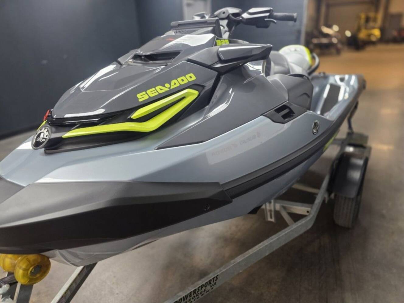 A photo of this 2026 Sea-Doo RXT-X 325 Ice Metal Manta Green