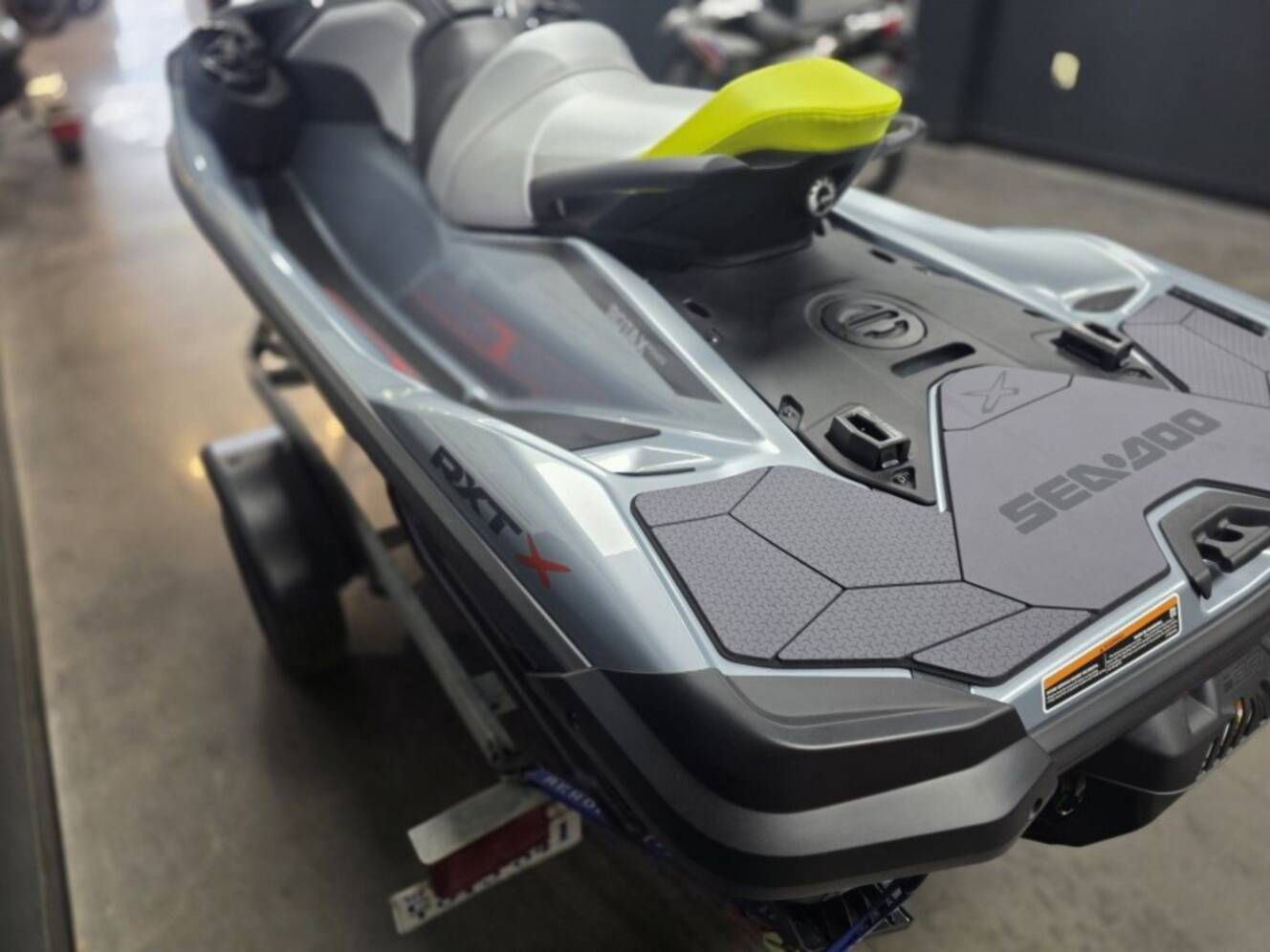 A photo of this 2026 Sea-Doo RXT-X 325 Ice Metal Manta Green