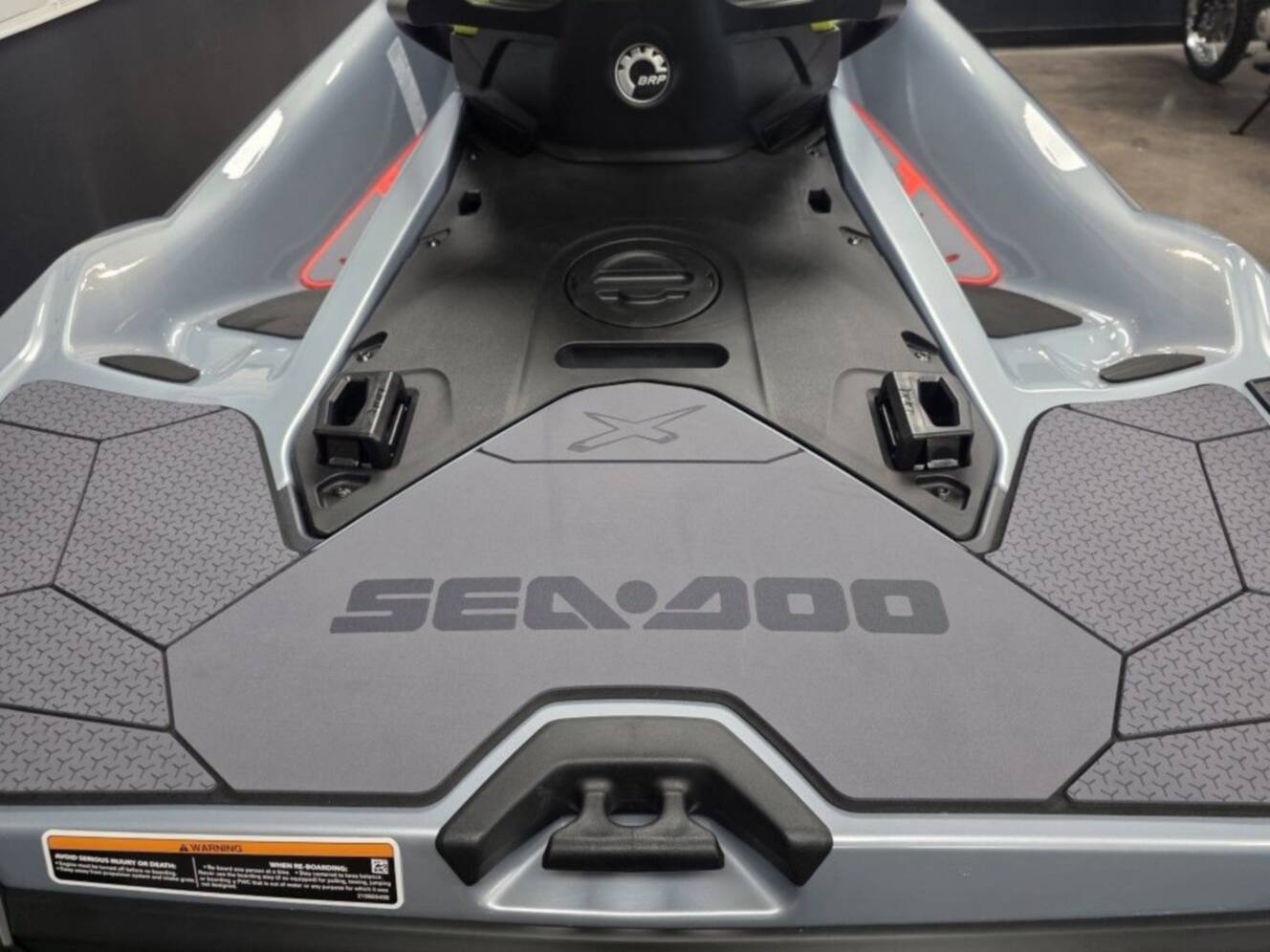 A photo of this 2026 Sea-Doo RXT-X 325 Ice Metal Manta Green