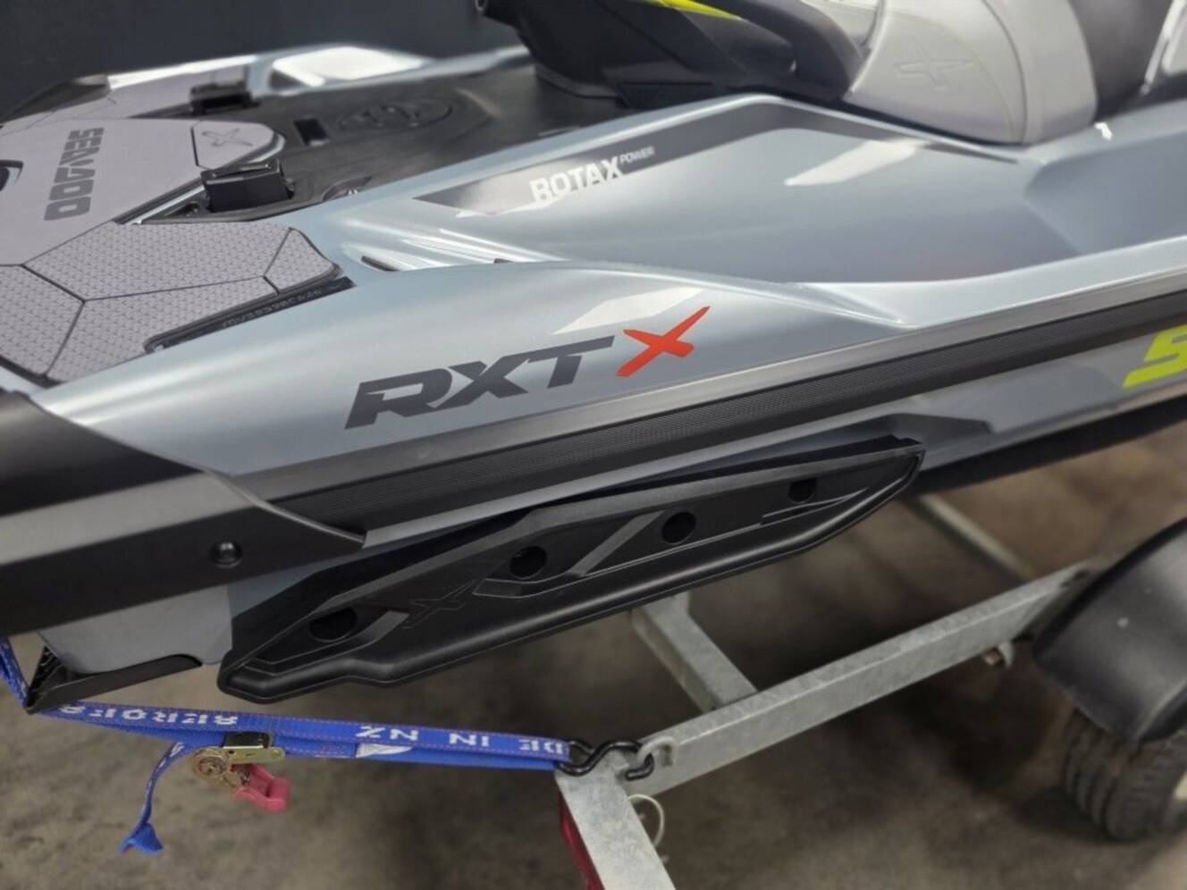 A photo of this 2026 Sea-Doo RXT-X 325 Ice Metal Manta Green