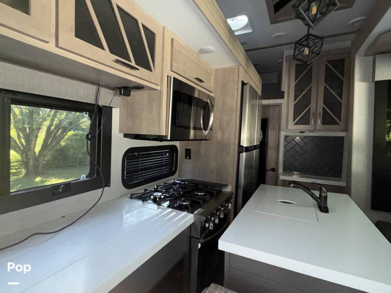 A photo of this 2023 Grand Design Momentum 410TH