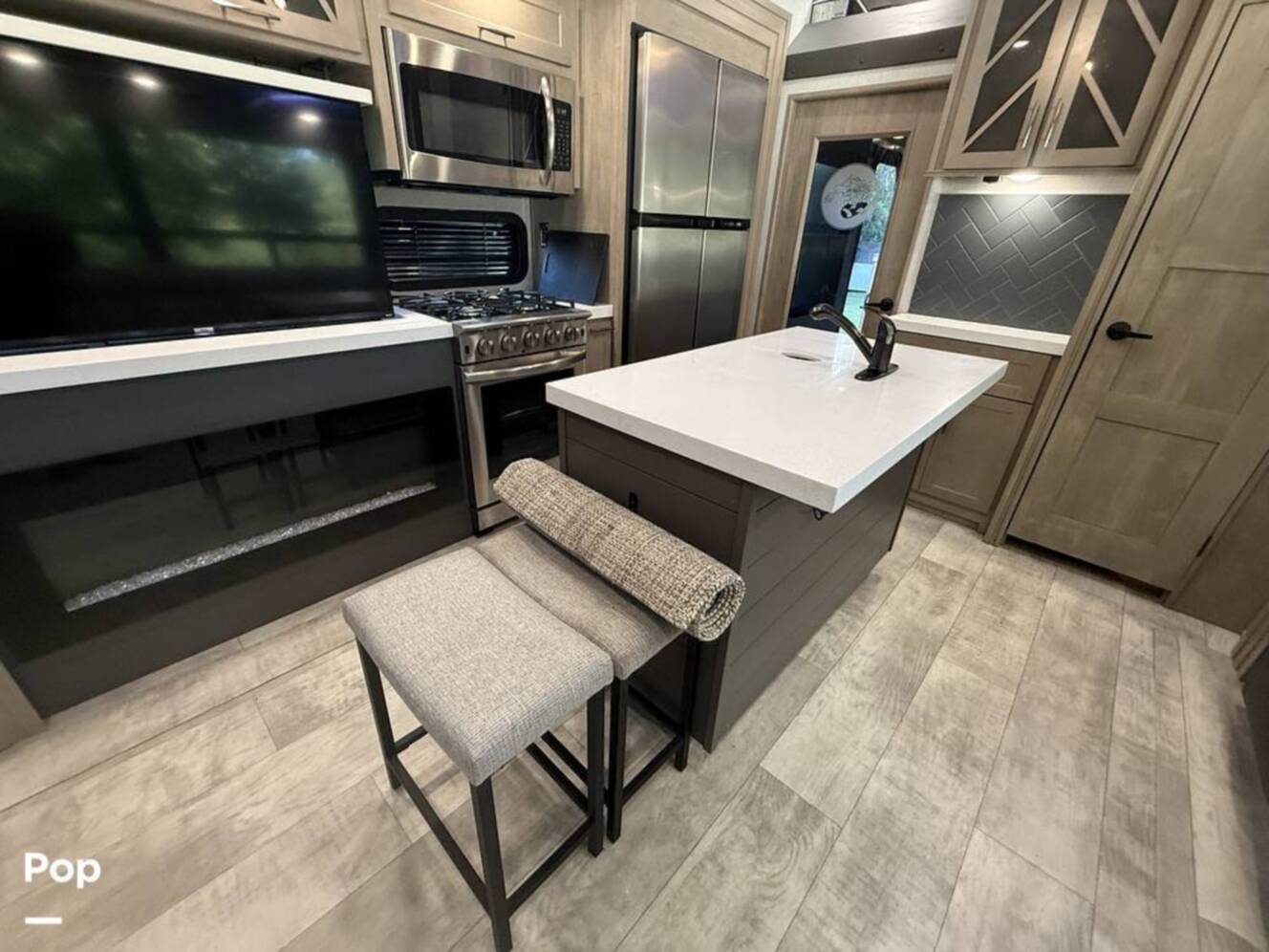 A photo of this 2023 Grand Design Momentum 410TH