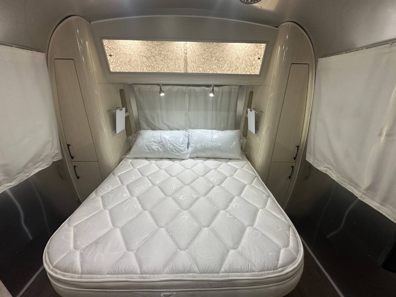 A photo of this 2019 Airstream International Serenity 28RB Queen