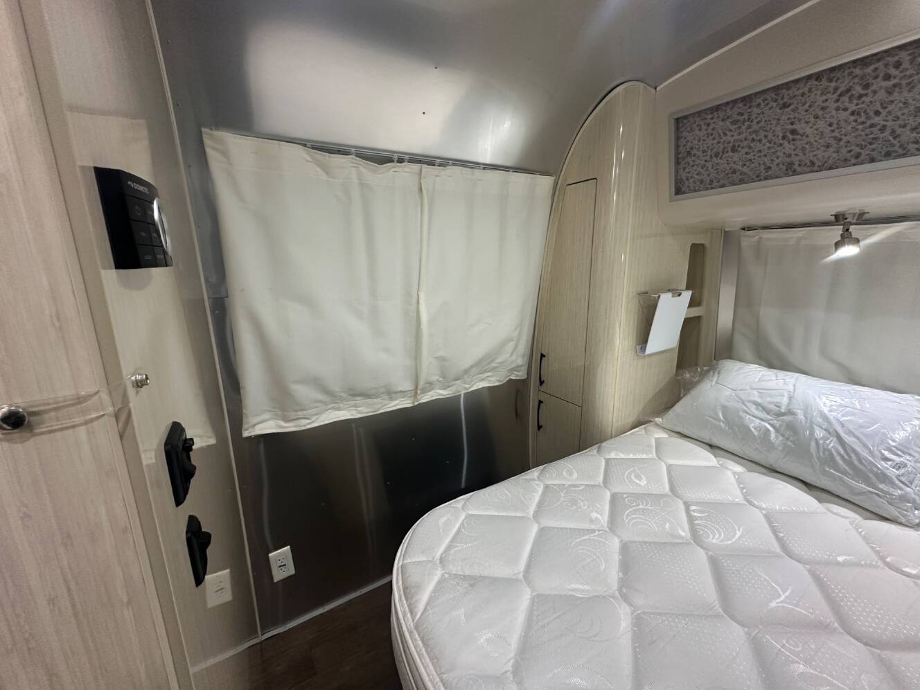 A photo of this 2019 Airstream International Serenity 28RB Queen