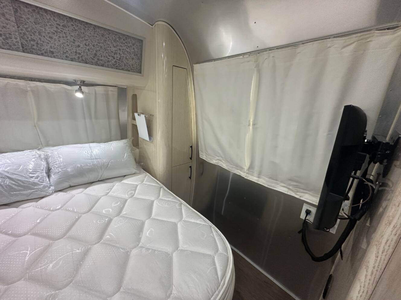 A photo of this 2019 Airstream International Serenity 28RB Queen