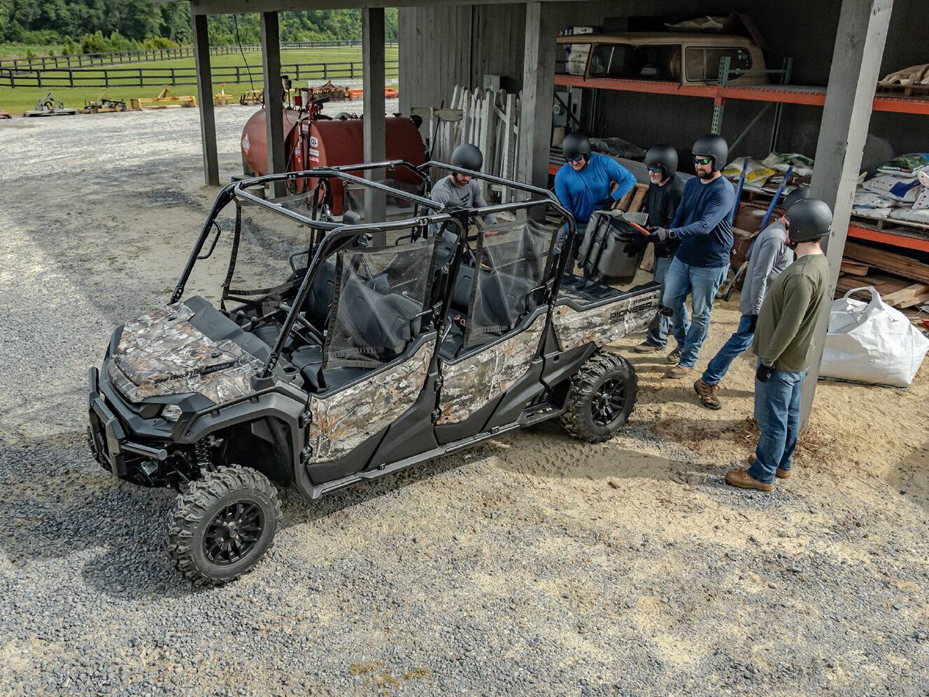 A photo of this 2025 Honda Pioneer 1000-6 Deluxe Crew