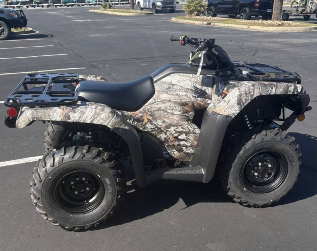 A photo of this 2027 Honda  FourTrax Rancher 4X4 TrueTimber Atera Camo