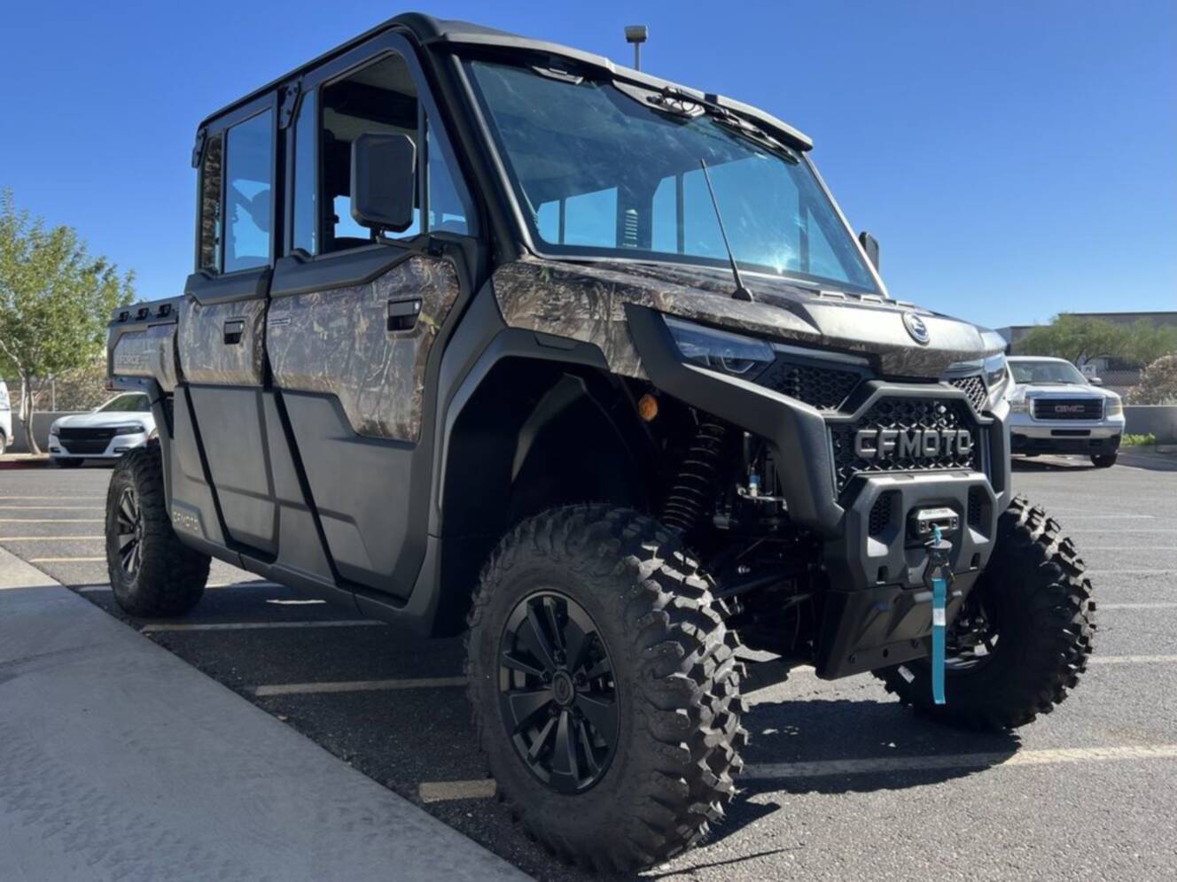 A photo of this 2026 CFMOTO UFORCE U10 XL Pro Highland Camo