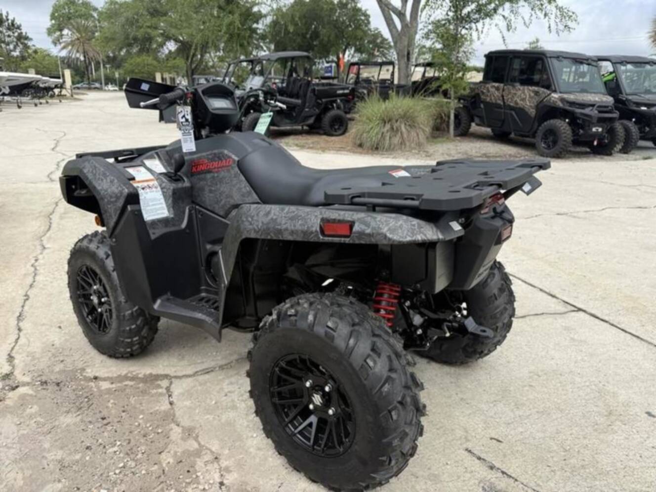 A photo of this 2025 Suzuki KingQuad 500 AXi Power Steering SE Camo