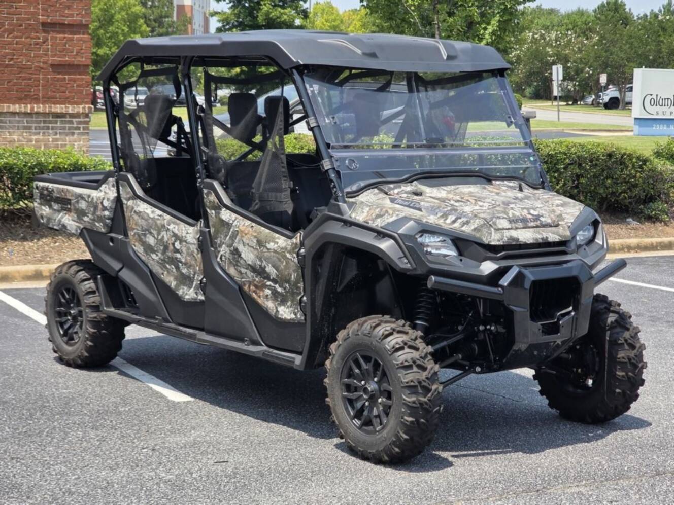 A photo of this 2025 Honda® Pioneer 1000-6 Deluxe Crew TrueTimber Atera Camo