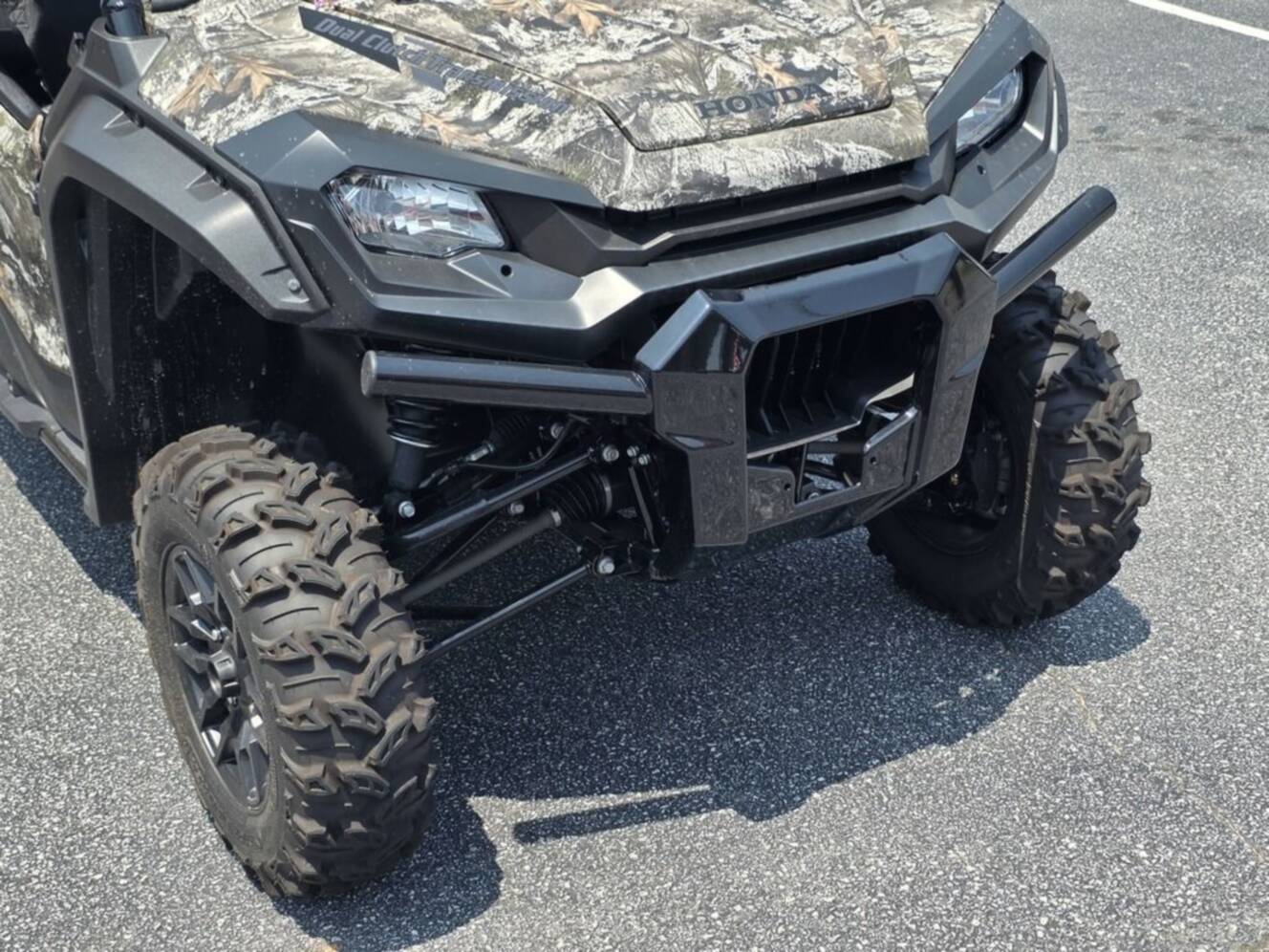 A photo of this 2025 Honda® Pioneer 1000-6 Deluxe Crew TrueTimber Atera Camo