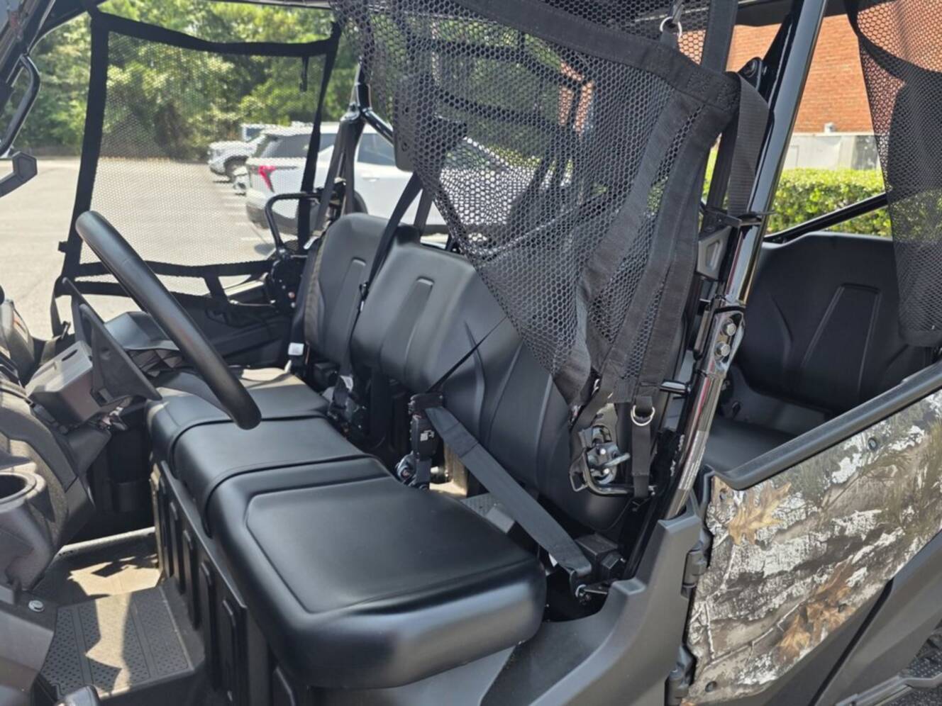 A photo of this 2025 Honda® Pioneer 1000-6 Deluxe Crew TrueTimber Atera Camo