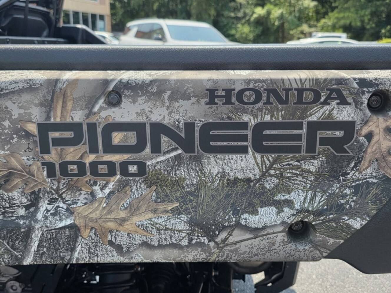 A photo of this 2025 Honda® Pioneer 1000-6 Deluxe Crew TrueTimber Atera Camo