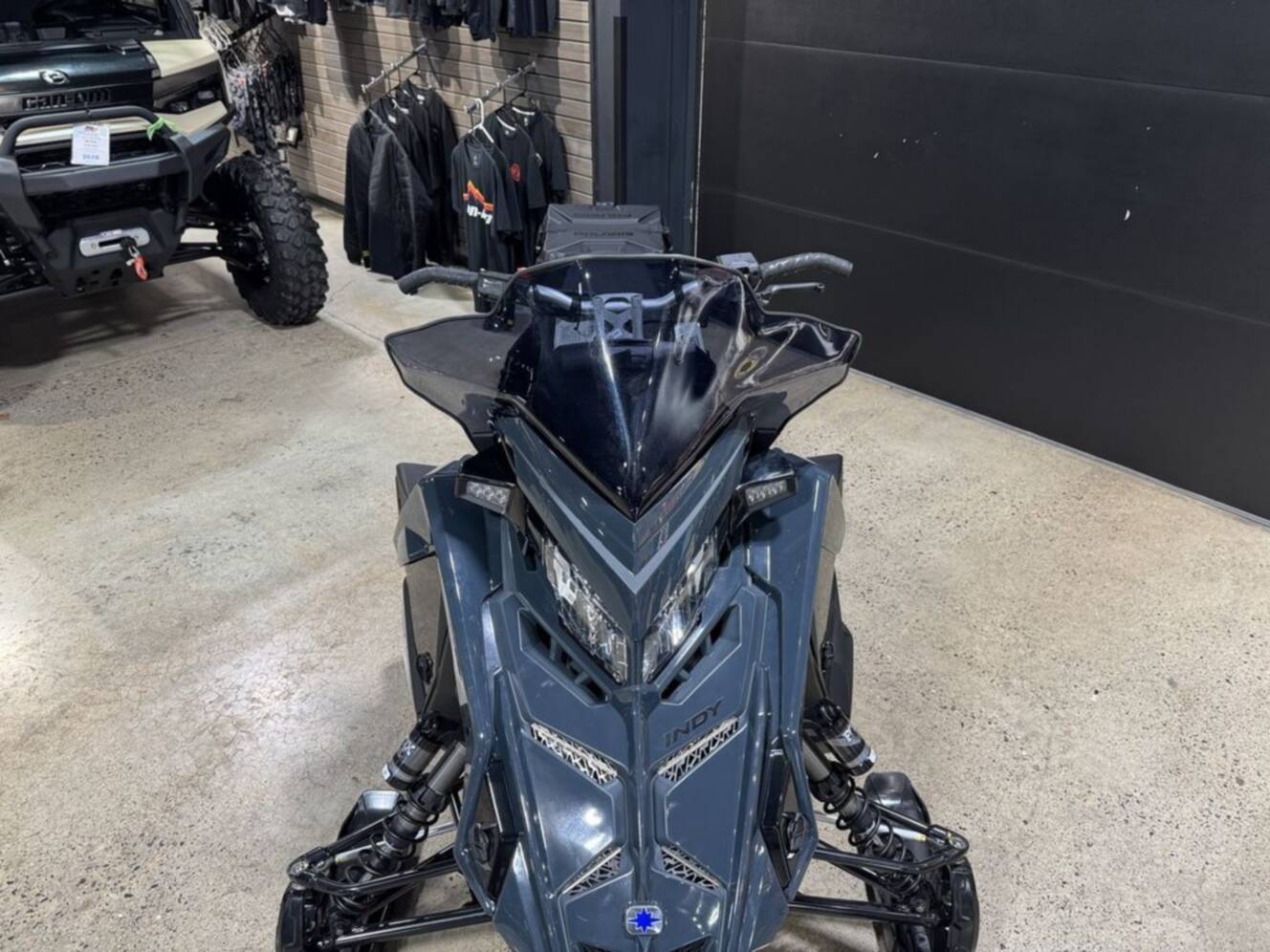A photo of this 2026 Polaris® 850 PRO RMK 155 Gloss Black / Blue Dusk