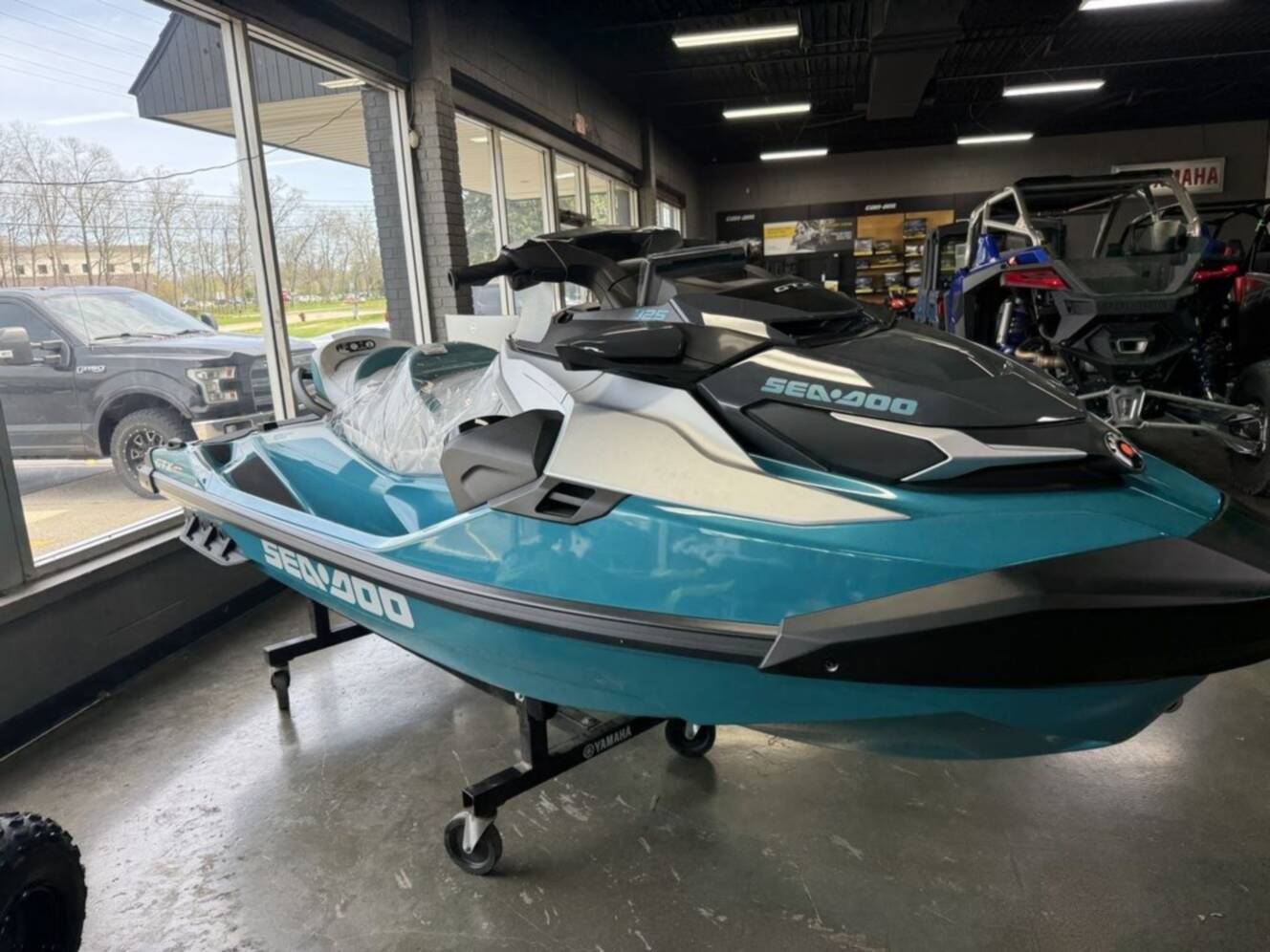 A photo of this 2026 Sea-Doo GTX Limited 325 Teal Metallic