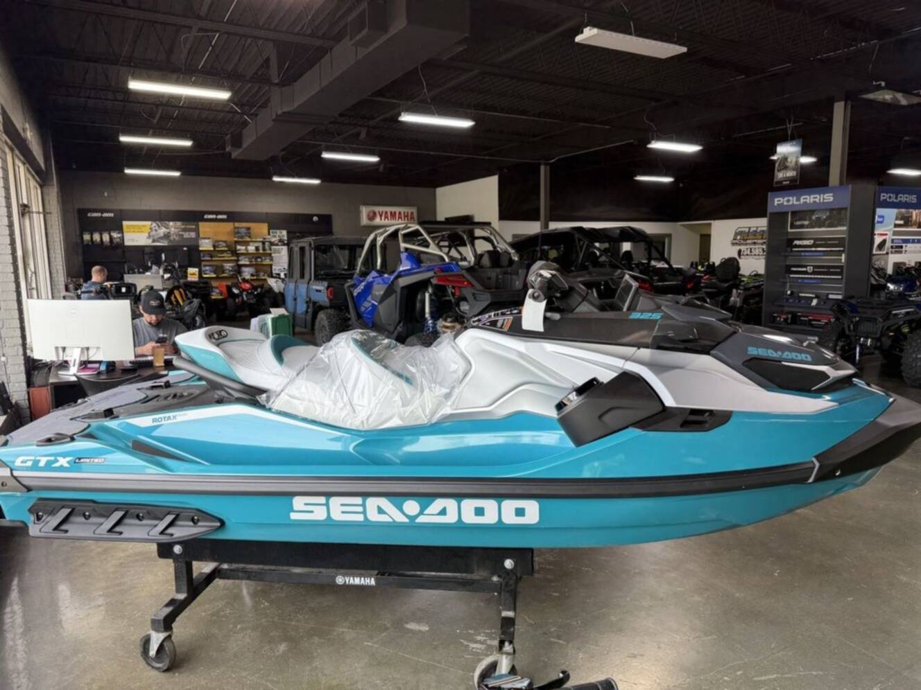 A photo of this 2026 Sea-Doo GTX Limited 325 Teal Metallic