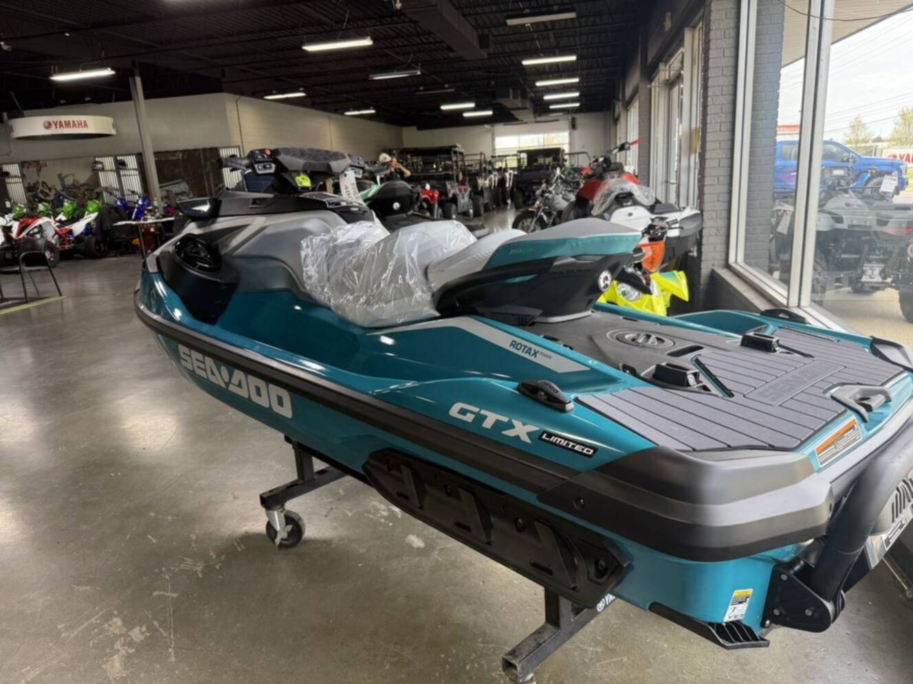 A photo of this 2026 Sea-Doo GTX Limited 325 Teal Metallic