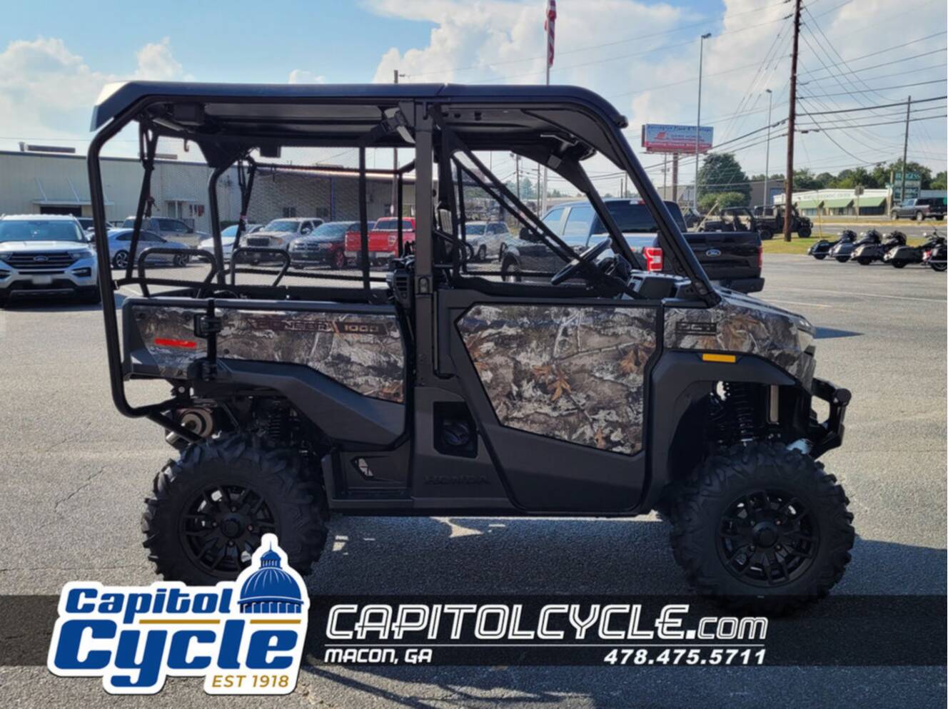 A photo of this 2026 Honda® Pioneer 1000-5 Deluxe TrueTimber Atera Camo