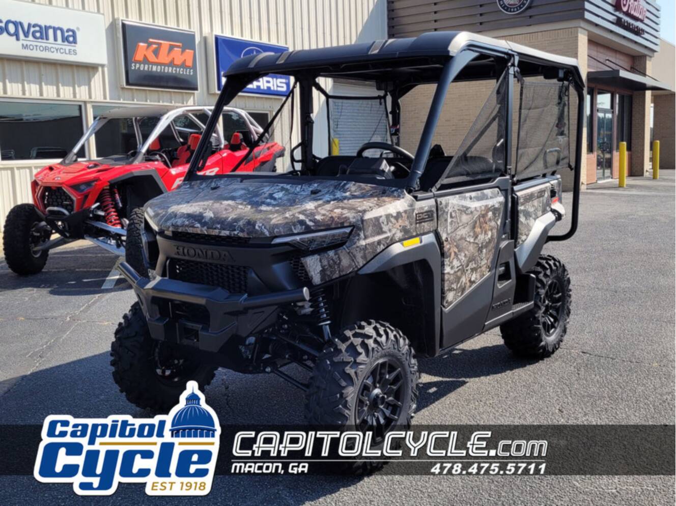 A photo of this 2026 Honda® Pioneer 1000-5 Deluxe TrueTimber Atera Camo