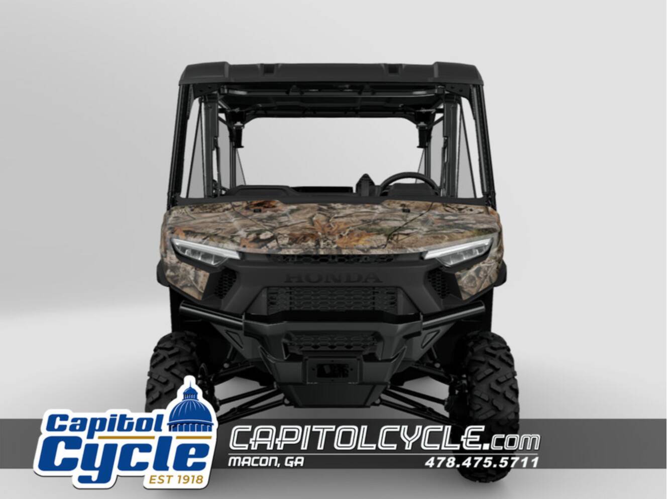 A photo of this 2026 Honda® Pioneer 1000-5 Deluxe TrueTimber Atera Camo