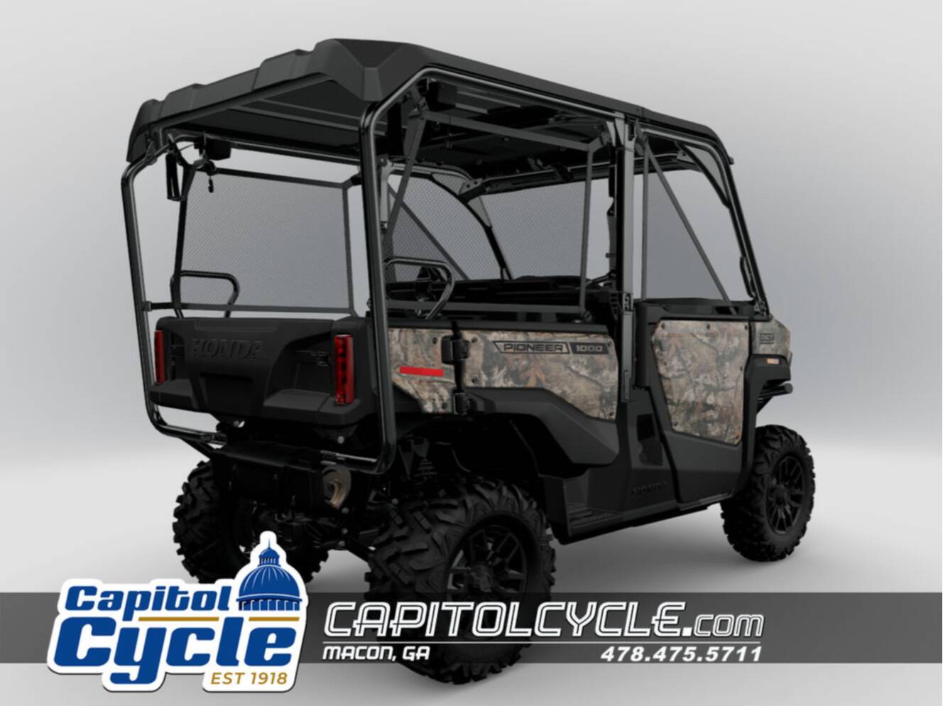 A photo of this 2026 Honda® Pioneer 1000-5 Deluxe TrueTimber Atera Camo