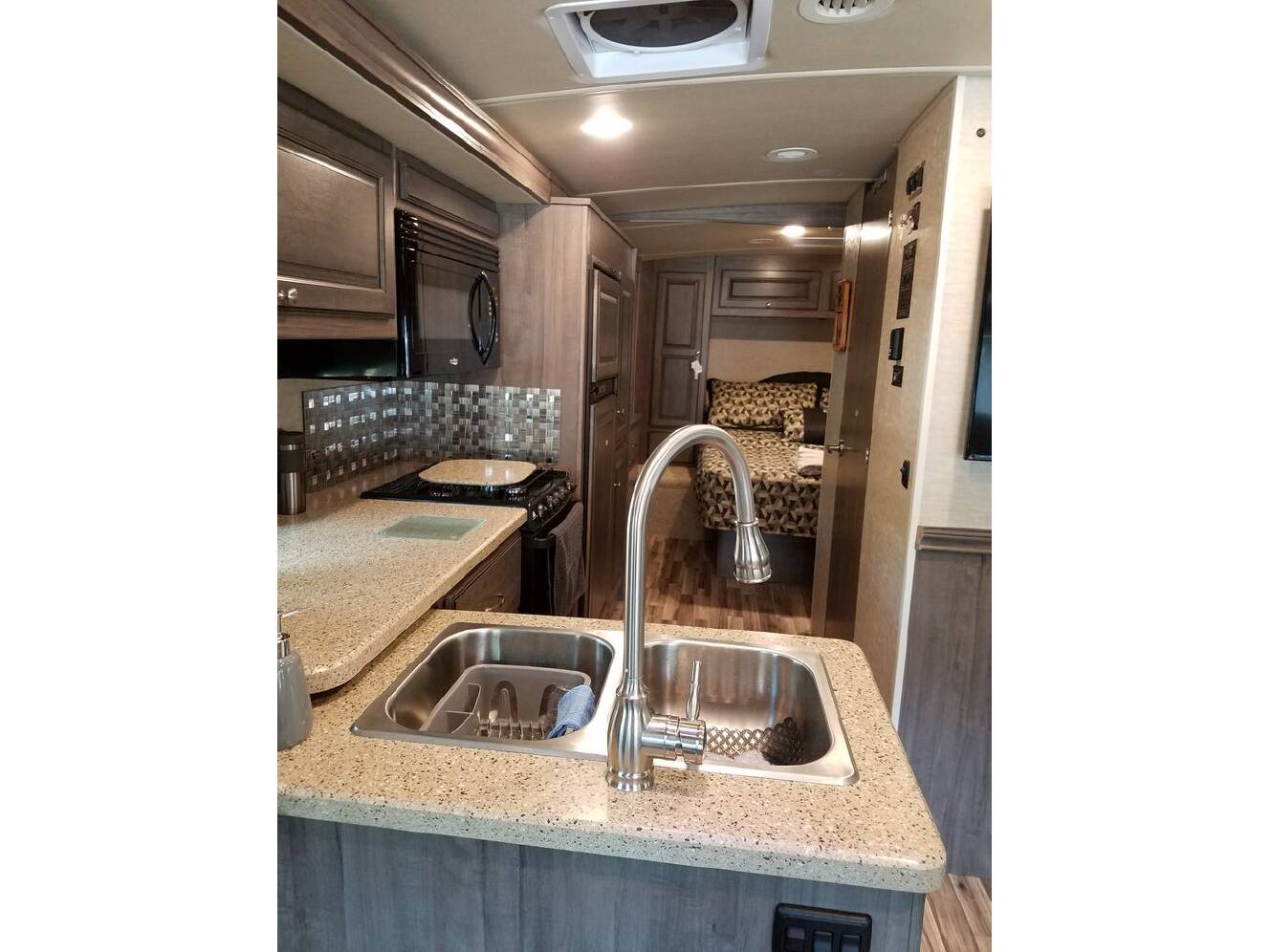 A photo of this 2017 Winnebago Vista LX 27N