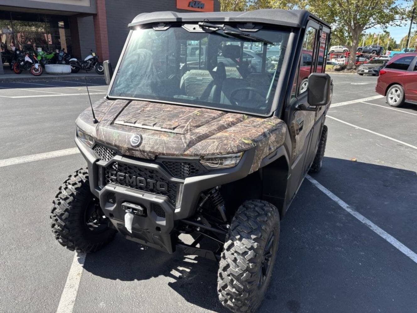 A photo of this 2027 CFMOTO UFORCE U10 XL Pro Highland EPS TrueTimber® Kanati Camo