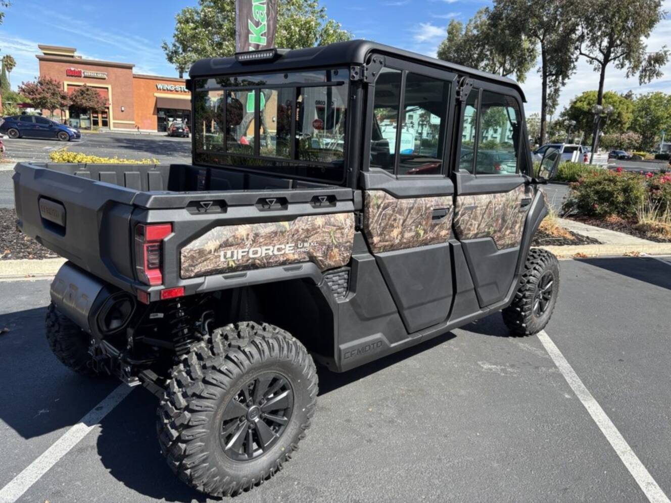 A photo of this 2027 CFMOTO UFORCE U10 XL Pro Highland EPS TrueTimber® Kanati Camo