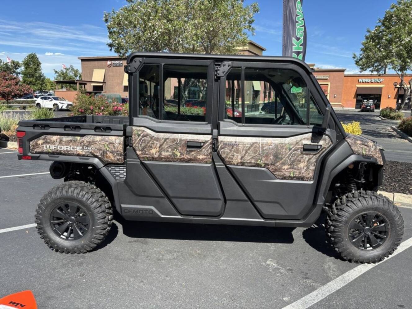 A photo of this 2027 CFMOTO UFORCE U10 XL Pro Highland EPS TrueTimber® Kanati Camo