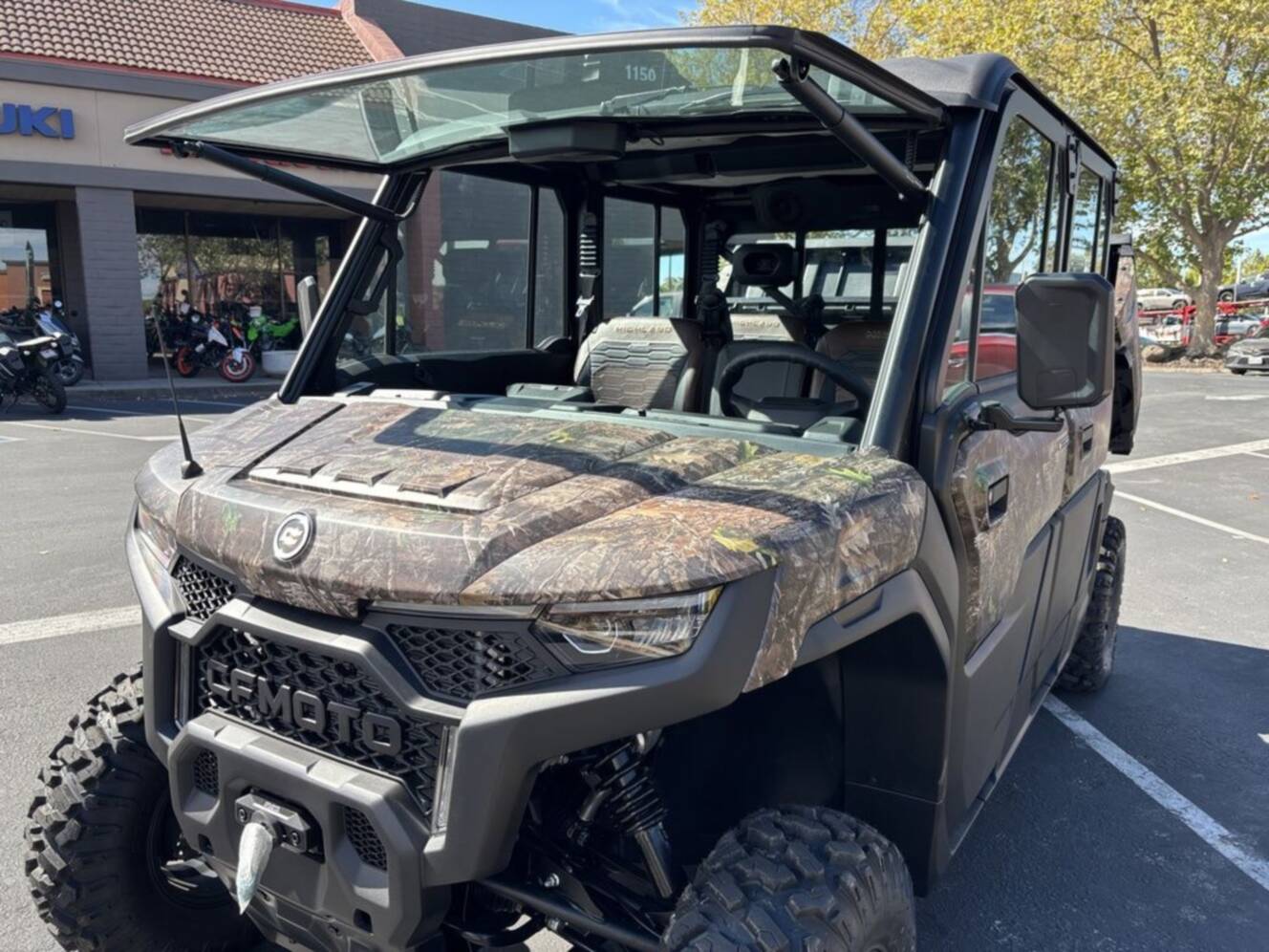 A photo of this 2027 CFMOTO UFORCE U10 XL Pro Highland EPS TrueTimber® Kanati Camo