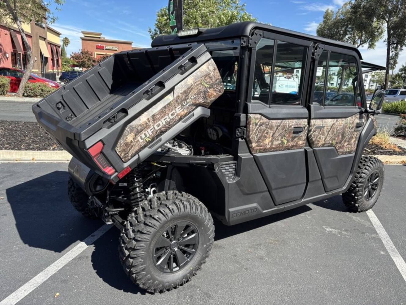 A photo of this 2027 CFMOTO UFORCE U10 XL Pro Highland EPS TrueTimber® Kanati Camo