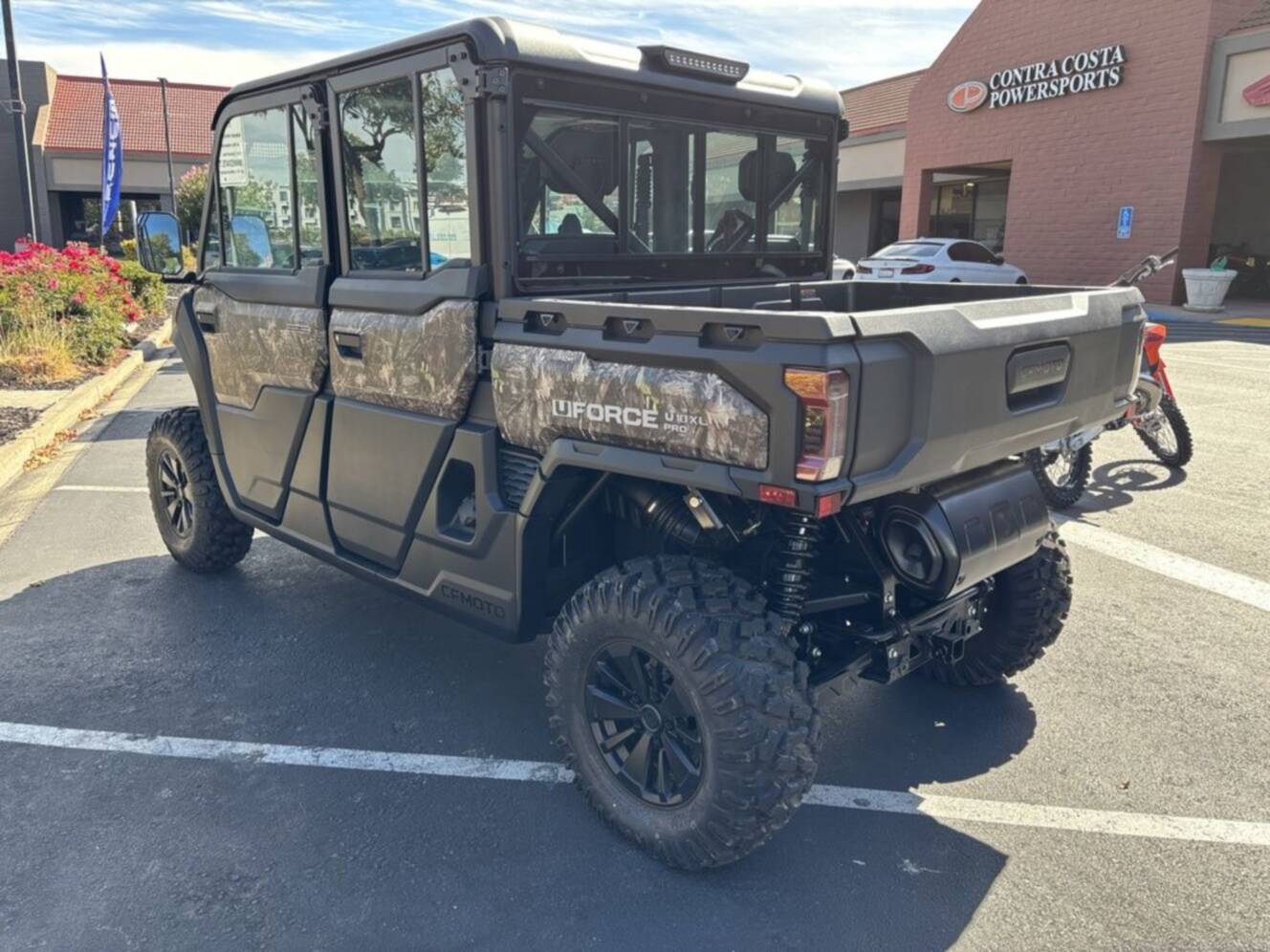 A photo of this 2027 CFMOTO UFORCE U10 XL Pro Highland EPS TrueTimber® Kanati Camo