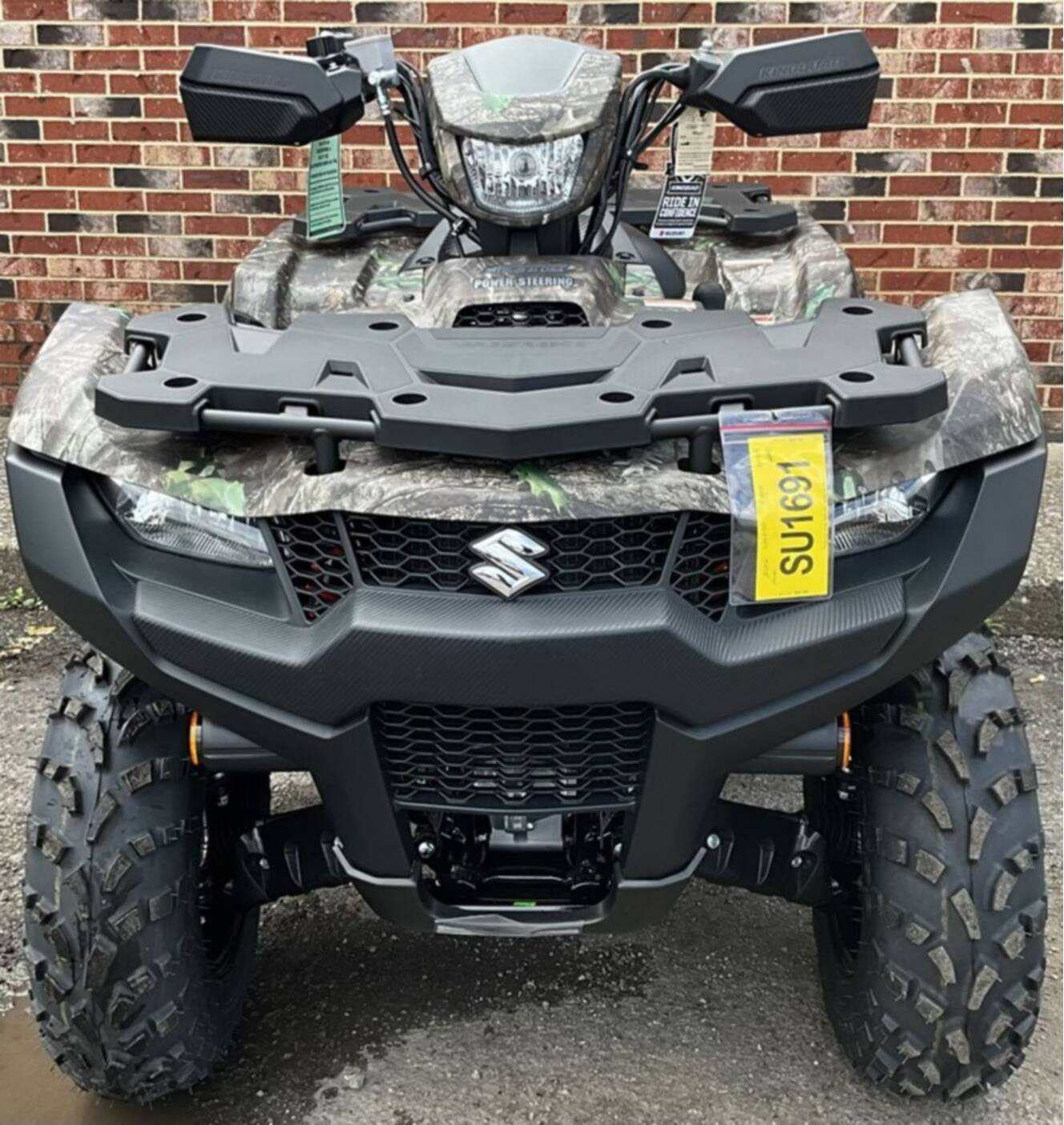 A photo of this 2026 Suzuki KingQuad 500AXi Power Steering SE Camo