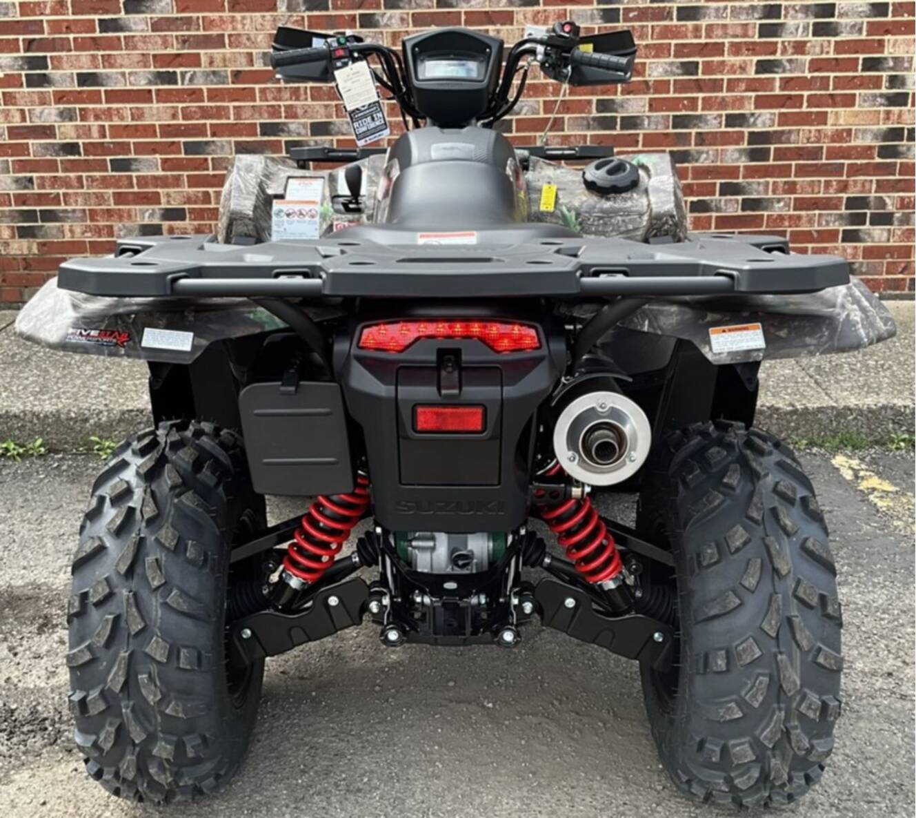 A photo of this 2026 Suzuki KingQuad 500AXi Power Steering SE Camo