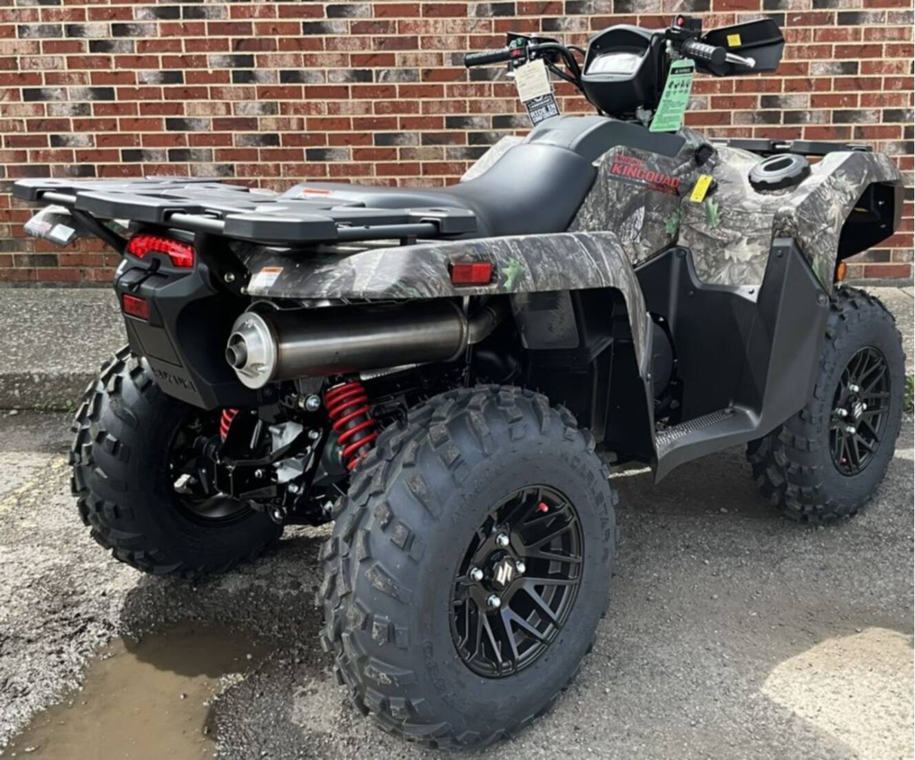 A photo of this 2026 Suzuki KingQuad 500AXi Power Steering SE Camo