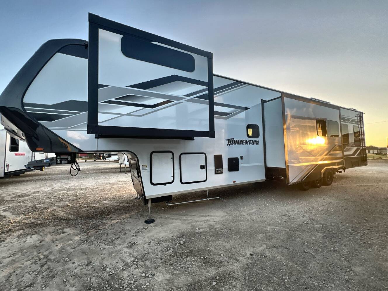 A photo of this 2027 Grand Design MOMENTUM 395MT