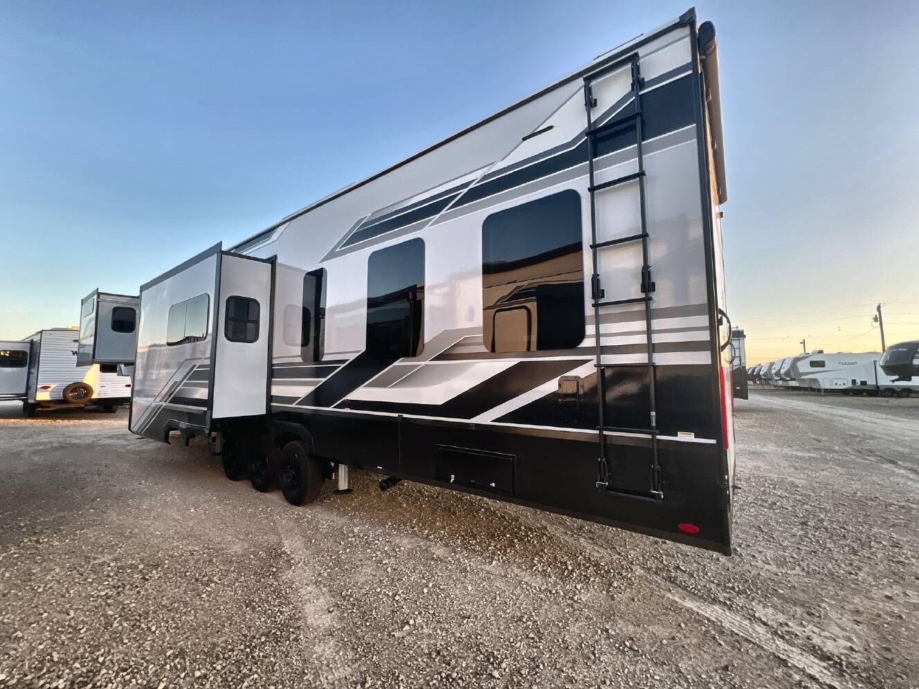 A photo of this 2027 Grand Design MOMENTUM 395MT
