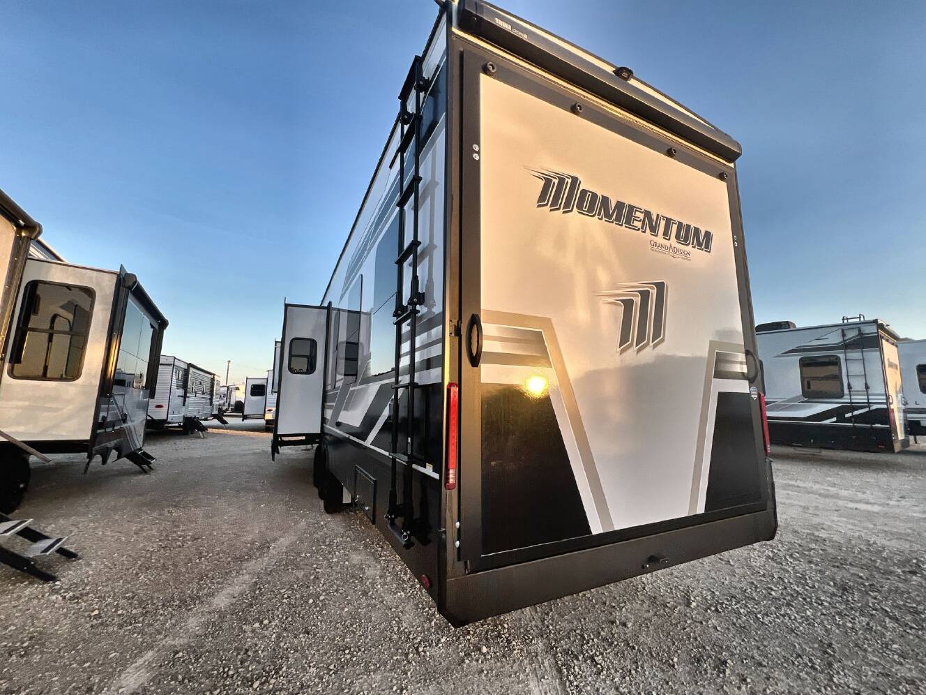 A photo of this 2027 Grand Design MOMENTUM 395MT