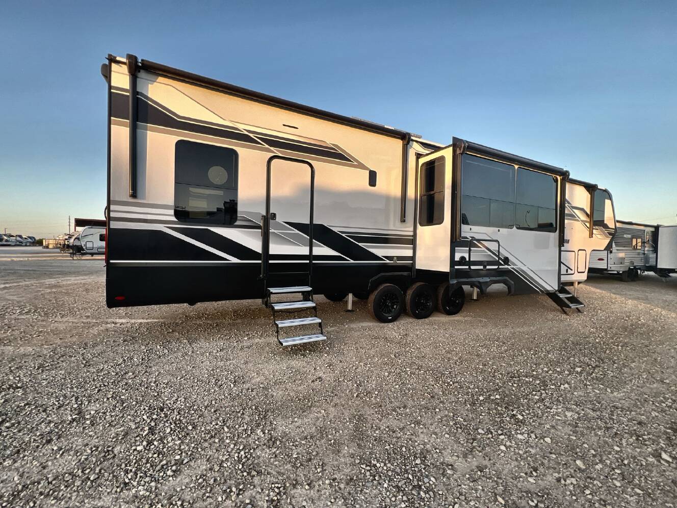 A photo of this 2027 Grand Design MOMENTUM 395MT