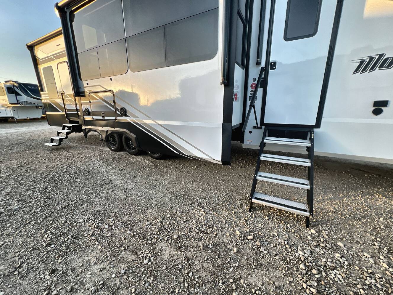 A photo of this 2027 Grand Design MOMENTUM 395MT