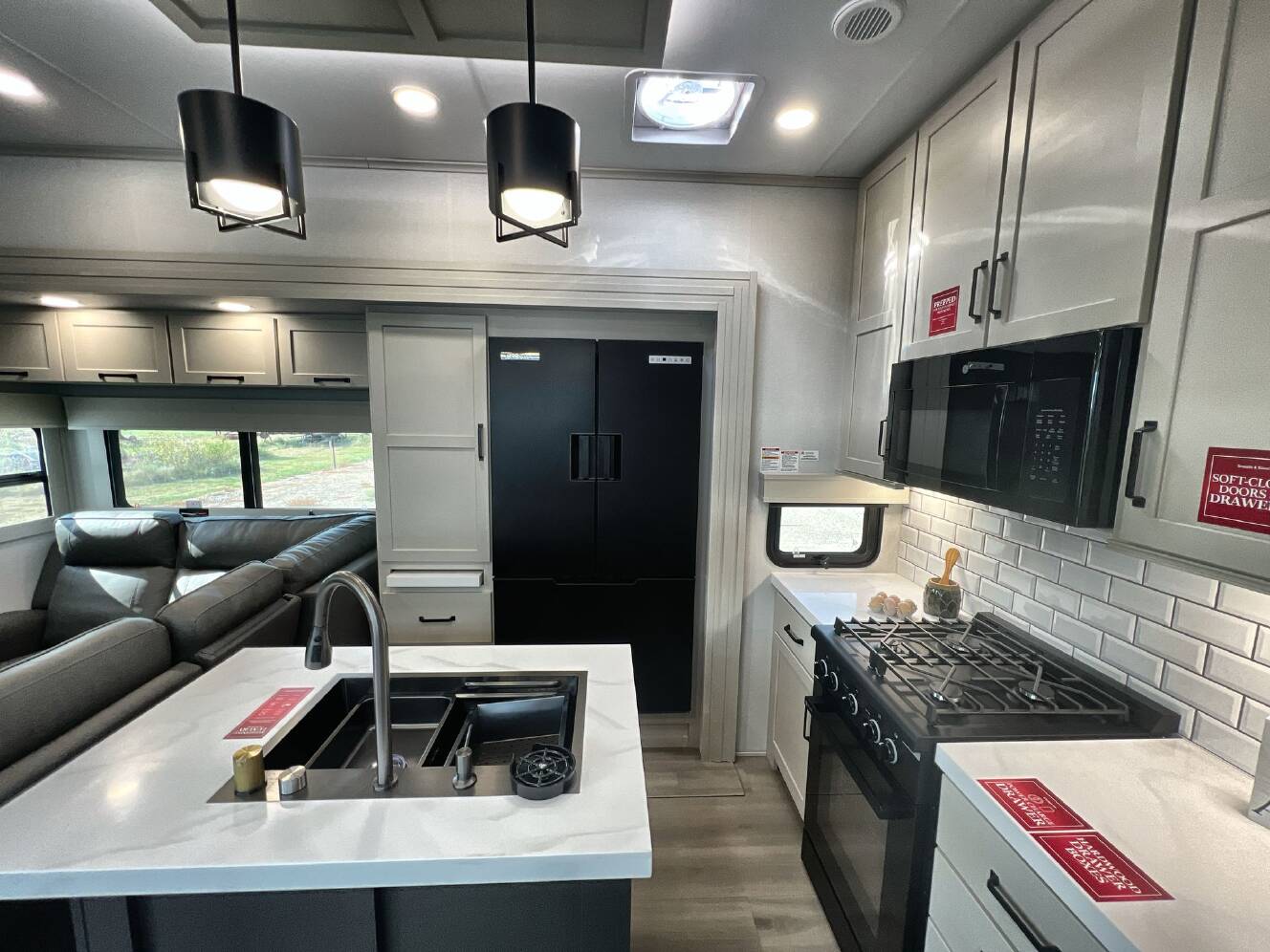 A photo of this 2027 Grand Design MOMENTUM 395MT