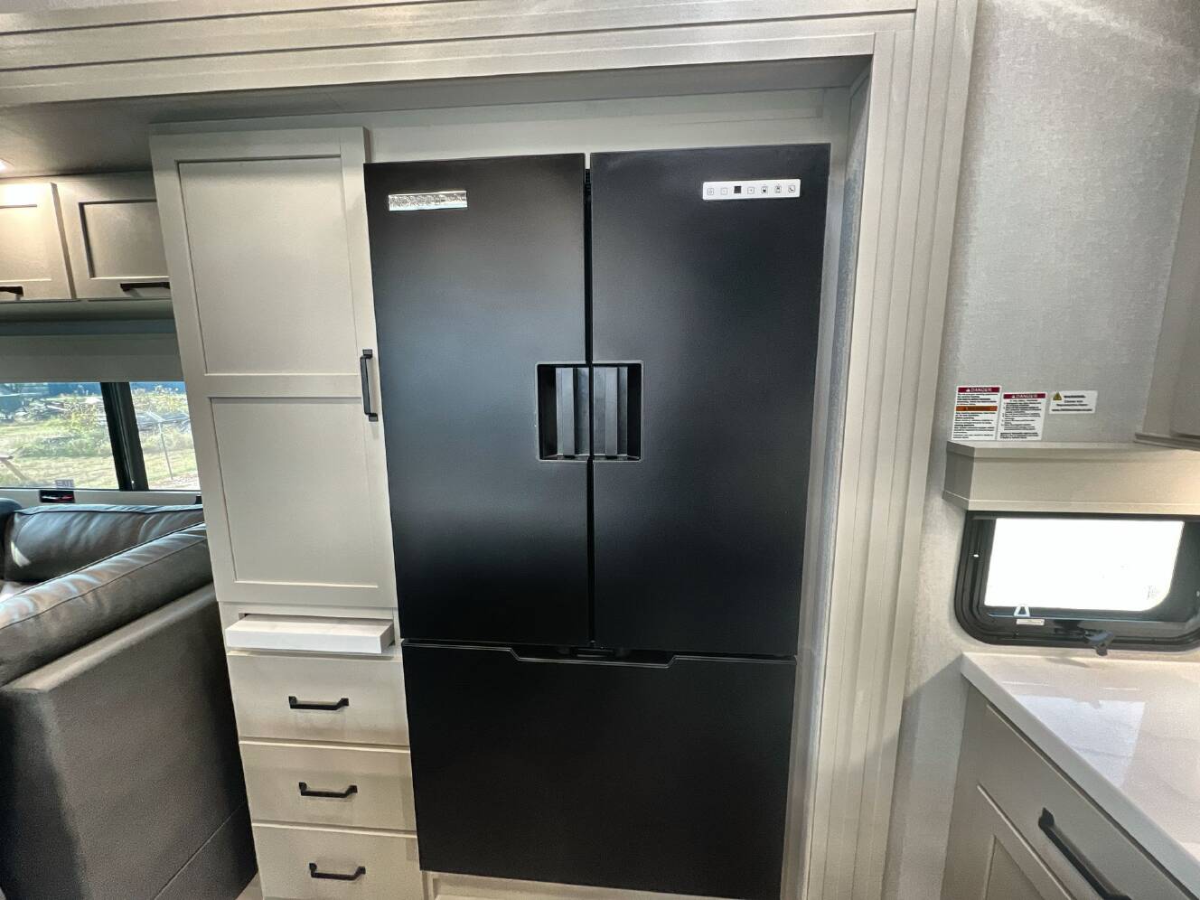 A photo of this 2027 Grand Design MOMENTUM 395MT