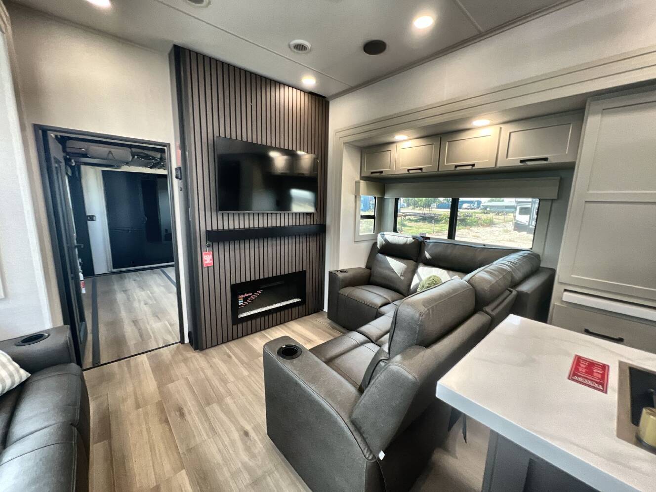 A photo of this 2027 Grand Design MOMENTUM 395MT