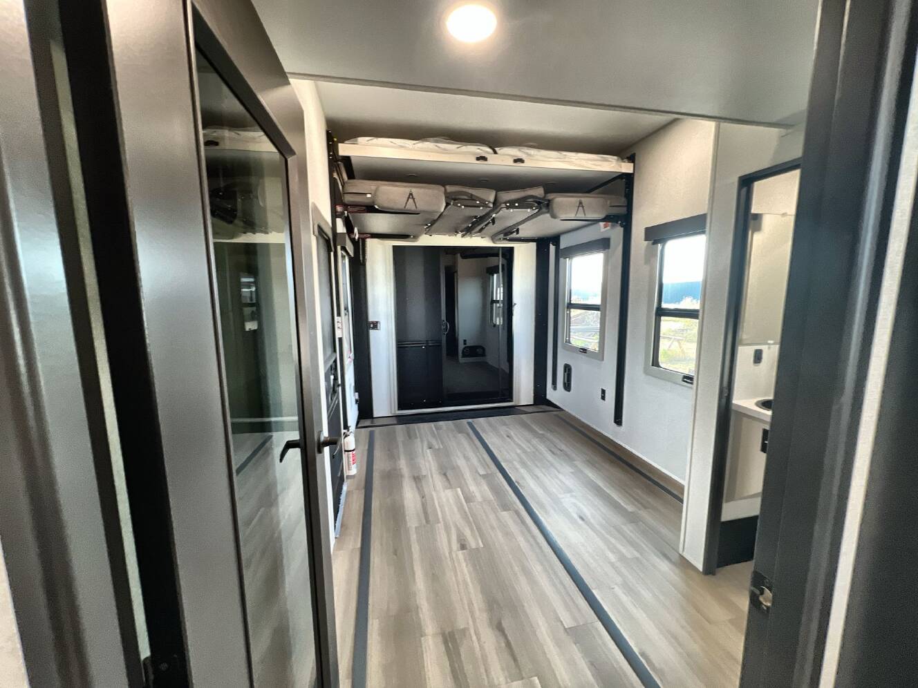 A photo of this 2027 Grand Design MOMENTUM 395MT