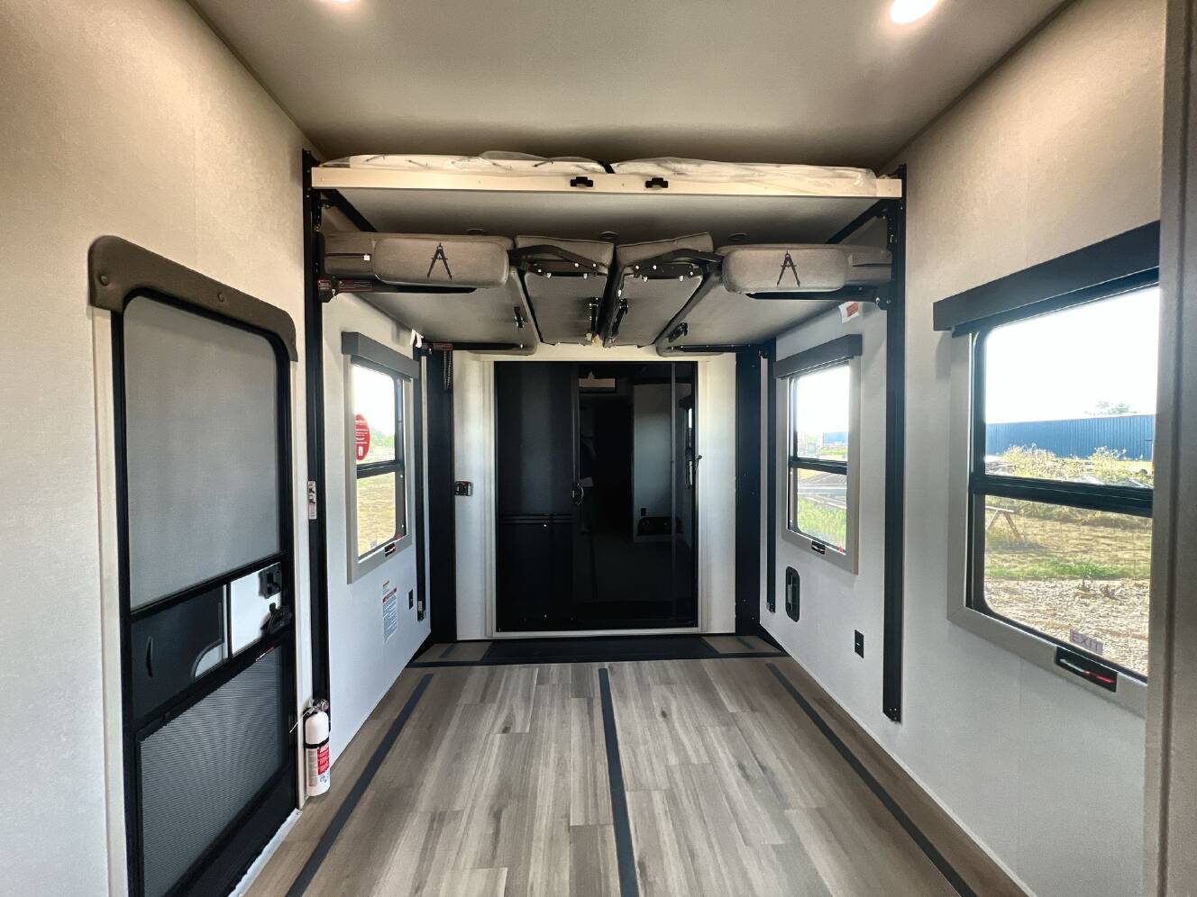 A photo of this 2027 Grand Design MOMENTUM 395MT