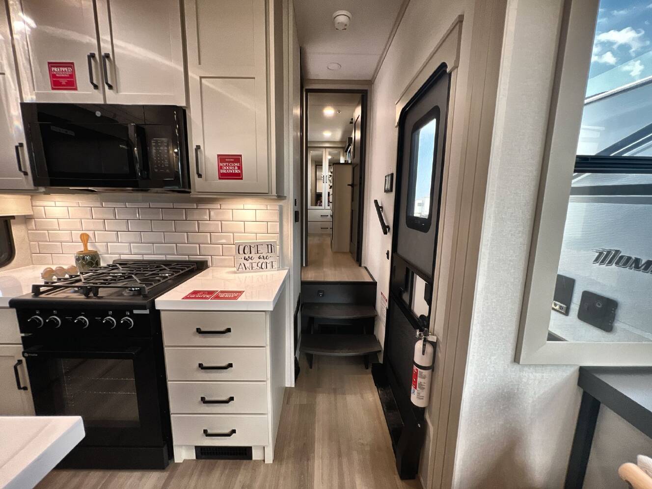 A photo of this 2027 Grand Design MOMENTUM 395MT